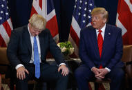 FILE - In this Tuesday, Sept. 24, 2019 file photo President Donald Trump meets with British Prime Minister Boris Johnson at the United Nations General Assembly, in New York. British Prime Minister Boris Johnson has said a lot of nice things about Donald Trump over the years, from expressing admiration for the U.S. president to suggesting he might be worthy of the Nobel Peace Prize. But after a mob of Trump supporters invaded the U.S. Capitol on Jan. 6, Johnson has changed his tune.(AP Photo/Evan Vucci, File)