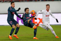 Soccer Football - Europa League Round of 16 Second Leg - Lokomotiv Moscow vs Atletico Madrid - RZD Arena, Moscow, Russia - March 15, 2018 Atletico Madrid's Sime Vrsaljko and Jose Gimenez in action with Lokomotiv Moscow's Anton Miranchuk REUTERS/Sergei Karpukhin