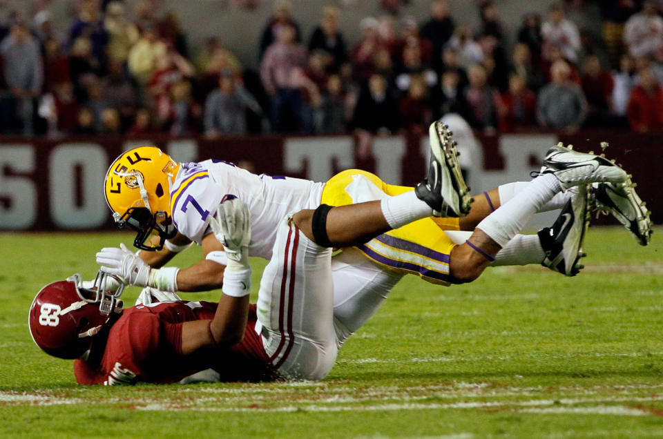 TUSCALOOSA, AL - NOVEMBER 05: Tyrann Mathieu #7 of the LSU Tigers tackles Michael Williams #89 of the Alabama Crimson Tide during the game at Bryant-Denny Stadium on November 5, 2011 in Tuscaloosa, Alabama. (Photo by Kevin C. Cox/Getty Images)