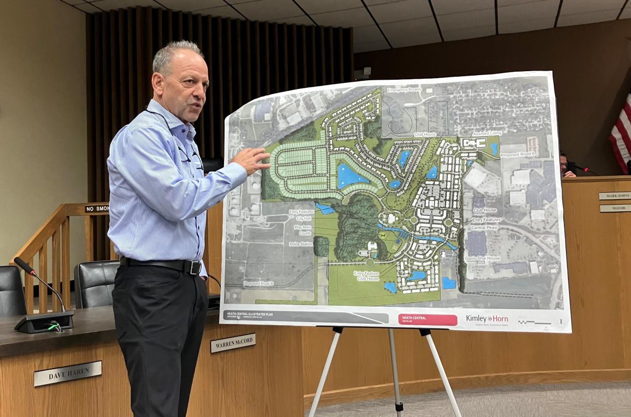 Joe Ciminello, principal with Ciminello Land Company, of New Albany, presents plans for a mixed-use development on 320 acres west of Heath Walmart, to the Heath Planning Commission on Thursday night.