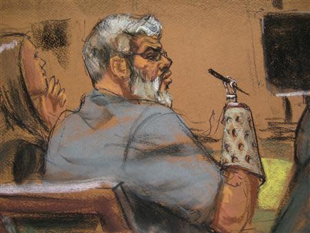 Abu Hamza al-Masri, the radical Islamist cleric facing U.S. terrorism charges, wears a prosthetic device as he sits next to defense attorney Lindsay Lewis (L) in Manhattan federal court in New York in this artist's sketch, April 17, 2014. REUTERS/Jane Rosenberg