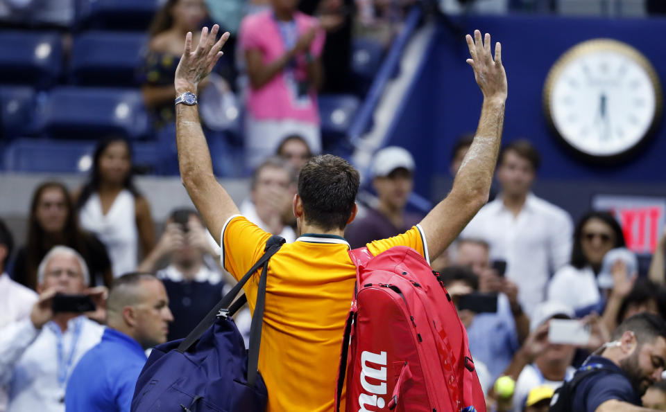 Juan Martin del Potro, of Argentina, waves to fans following a match against Rafael Nadal, of Spain, during the semifinals of the U.S. Open tennis tournament, Friday, Sept. 7, 2018, in New York. Nadal retired from the match. (AP Photo/Adam Hunger)