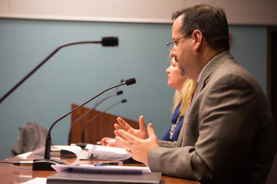 DART CEO John Sisson speaks to the Public Works & Transportation Committee on bus service changes at Rodney Square during a meeting in 2018.