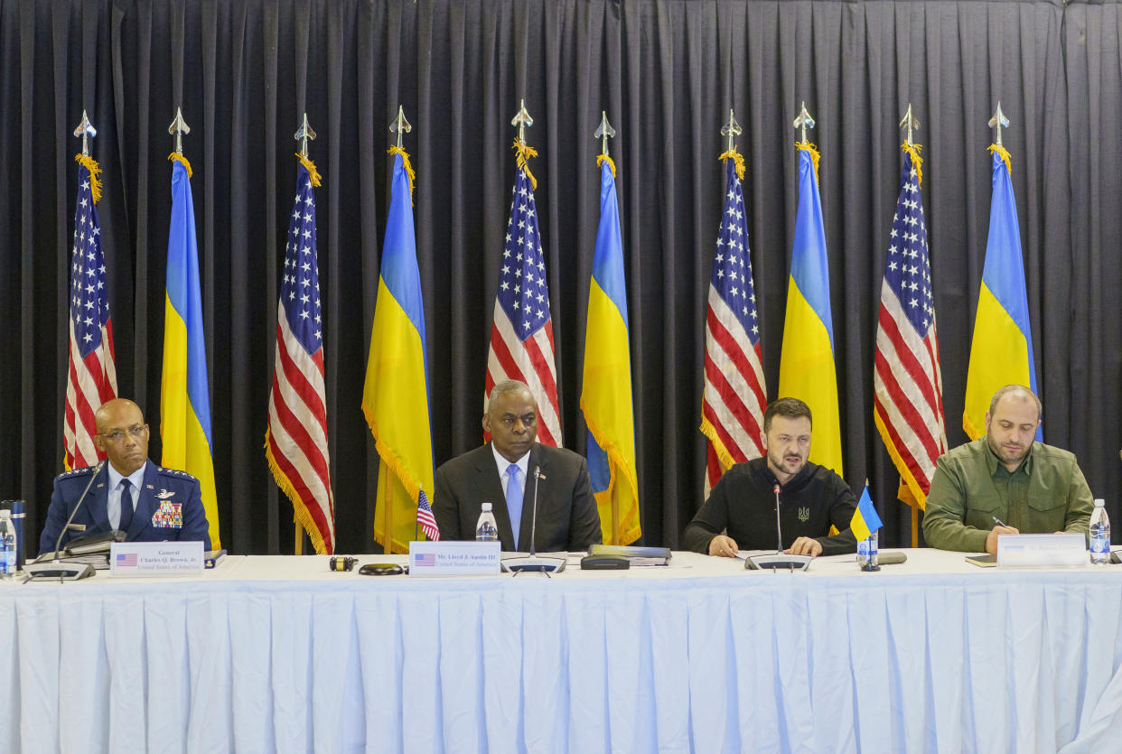 Joint Chiefs of Staff Air Force of the U.S. Gen. CQ Brown, from left, U.S. Defense Secretary Lloyd Austin, Ukraine's President Volodymyr Zelenskyy and Ukraine's Defense Minister Rustem Umerov attend a meeting at Ramstein Air Base in Ramstein-Miesenbach, Germany, Friday, Sept. 6, 2024. (Andreas Arnold/dpa via AP)