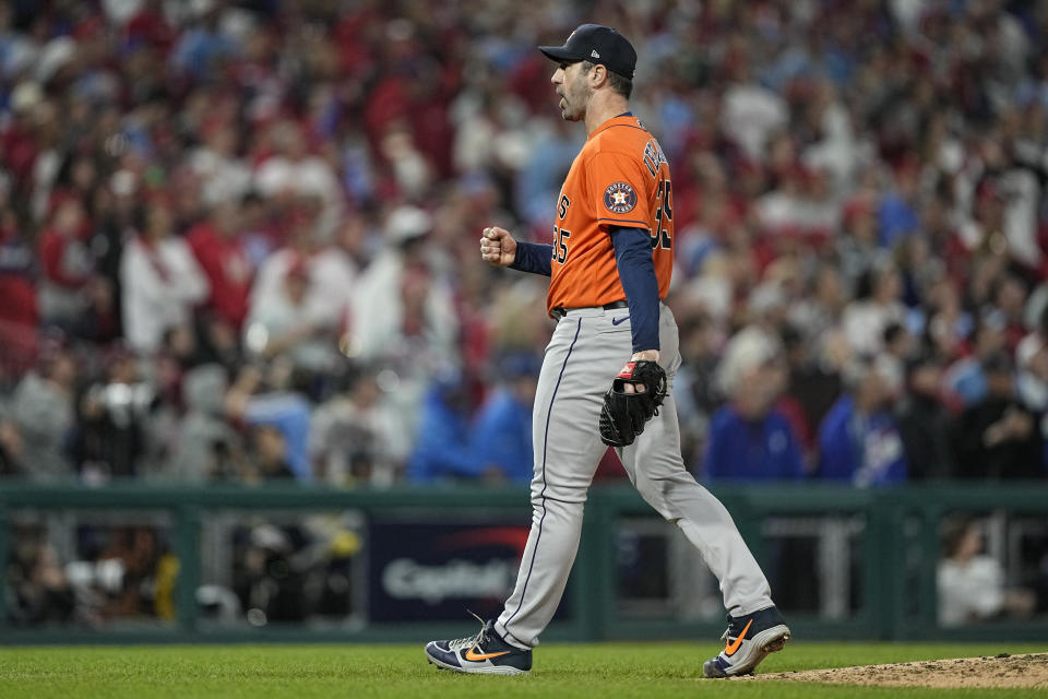 Houston Astros starting pitcher Justin Verlander celebrates the last out in the fifth inning in Game 5 of baseball's World Series between the Houston Astros and the Philadelphia Phillies on Thursday, Nov. 3, 2022, in Philadelphia. (AP Photo/David J. Phillip)