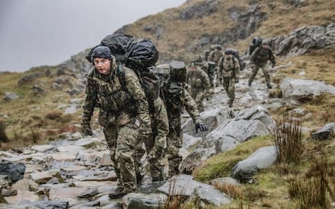 The report says that "microaggressions" can be exacerbated by military culture. Image of Royal Marines attempting to reach the summit of Mount Snowden during Exercise Winter Walker in 2018. - Credit: Leading Phot Dean Nixon