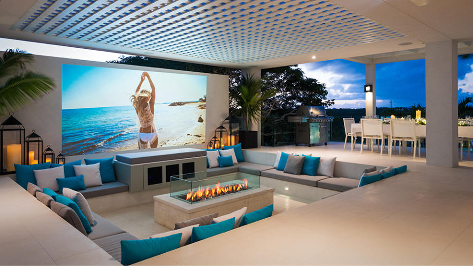 The stunning outdoor home theater with a fire pit - Credit: Steve Passmore/The Agency Turks & Caicos