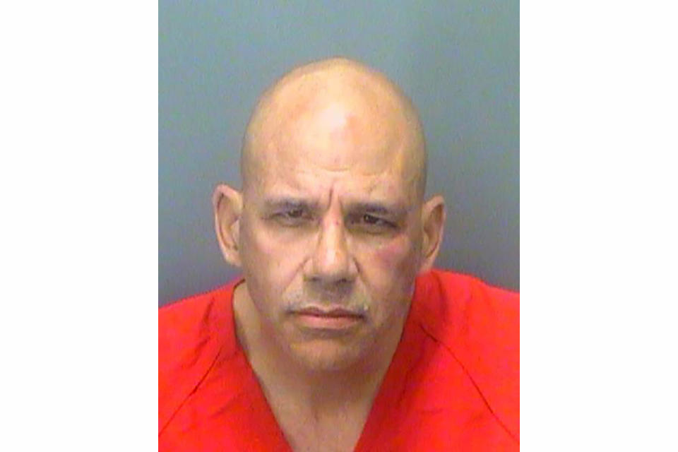 This booking photo from the Pinellas County Jail shows David Marc Ratcliff on Tuesday, Nov. 30, 2021. The serial Florida bank robber once dubbed the "I-4 bandit" was arrested Tuesday for a new holdup just months after his release from prison, police said. Ratcliff was caught after a brief chase in the Gulf Coast town of Belleair Beach following a robbery at a Wells Fargo branch in nearby Clearwater, Fla., authorities said. (Pinellas County Jail via AP)