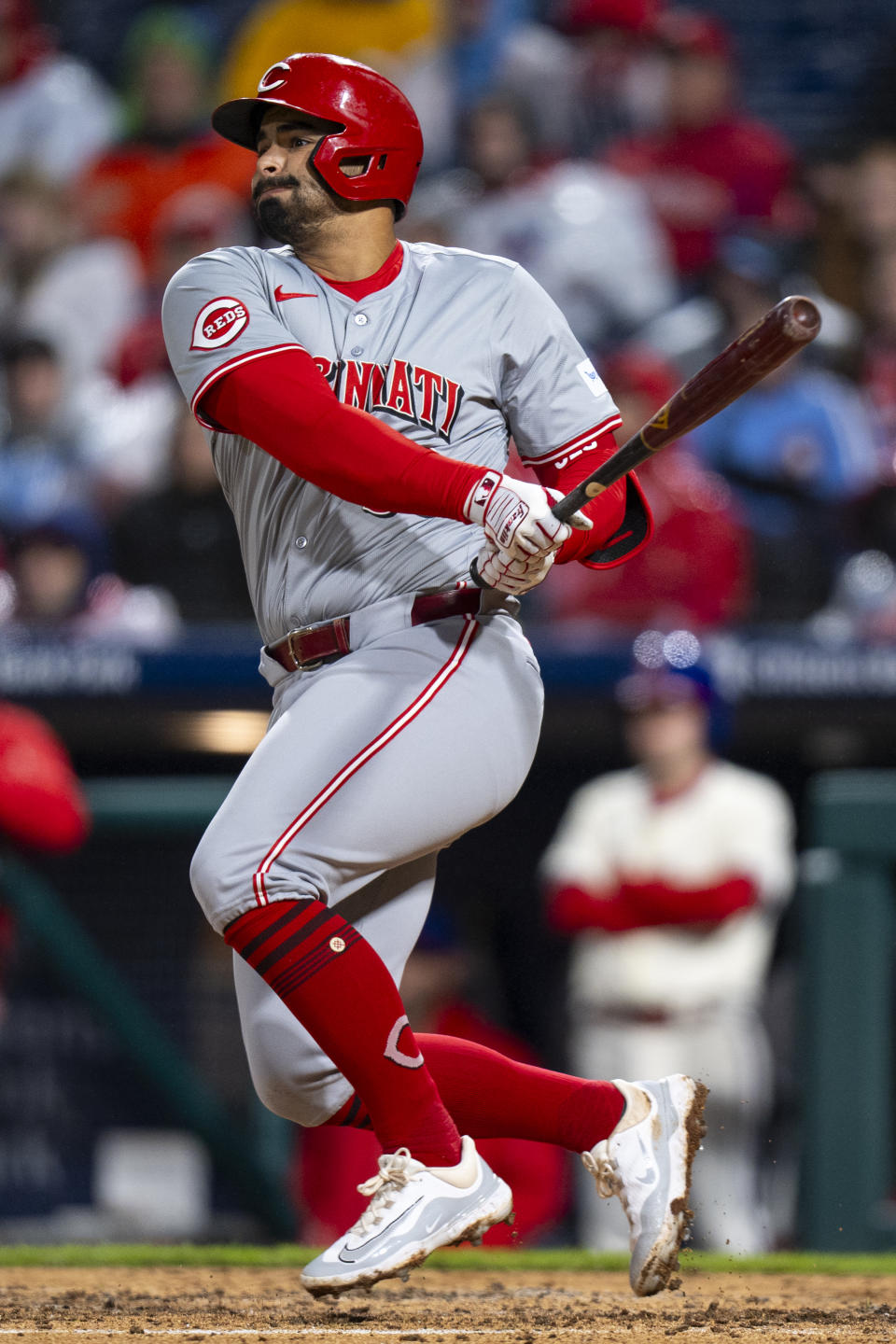 Cincinnati Reds' Christian Encarnacion-Strand watches his two-run double during the third inning of the team's baseball game against the Philadelphia Phillies, Wednesday, April 3, 2024, in Philadelphia. (AP Photo/Chris Szagola)