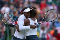 <p>Venus Williams (L) and Serena Williams (R) of the United States celebrate after defeating Maria Kirilenko and Nadia Petrova of Russia in their Women’s Doubles Tennis Semifinal match on Day 8 of the London 2012 Olympic Games at the All England Lawn Tennis and Croquet Club on August 4, 2012 in London, England. (Photo by Clive Brunskill/Getty Images) </p>