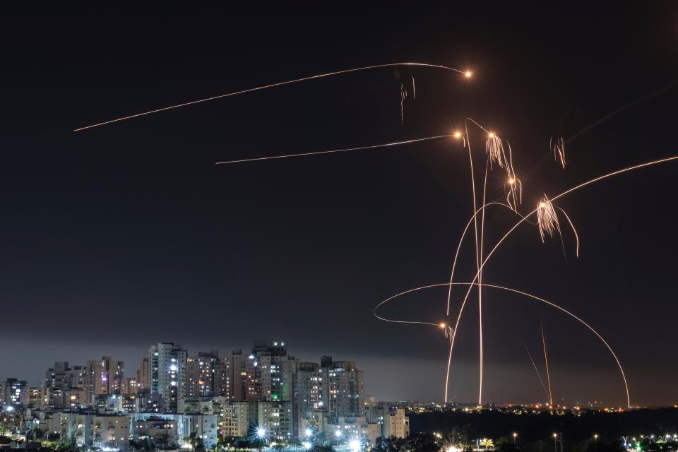Israel's Iron Dome missile defense system fires interceptors at rockets launched from the Gaza Strip.