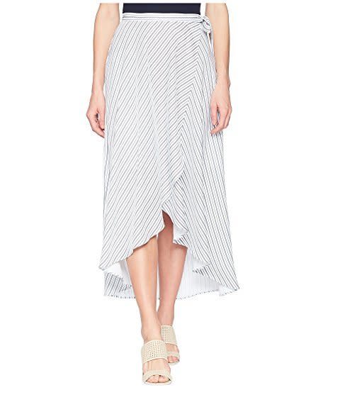 Get it at <a href="https://www.zappos.com/p/tribal-37-woven-crepe-long-wrap-skirt-in-white-white/product/9025901/color/14" target="_blank">Zappos</a>, $108.