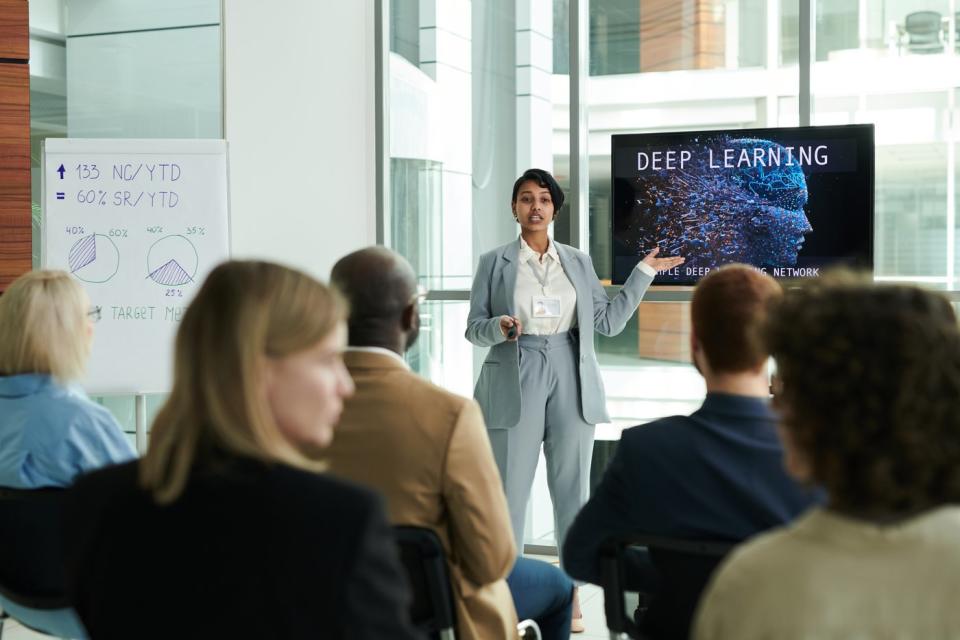 People attending a seminar about AI.