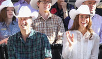 <p>Newlyweds Kate and William attend the Calgary Stampede in matching cowboy hats.</p>