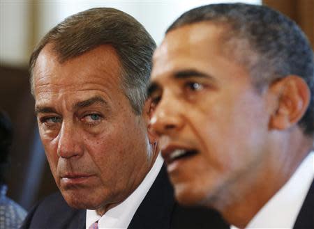 Speaker of the House John Boehner (R-OH) (L) listens to U.S. President Barack Obama during a meeting with bipartisan Congressional leaders in the Cabinet Room at the White House in Washington to discuss a military response to Syria, September 3, 2013. REUTERS/Larry Downing