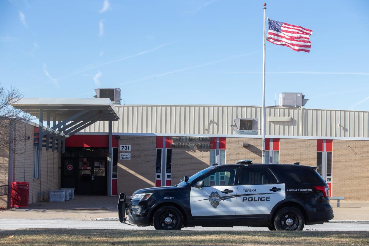 A Topeka police patrol vehicle is parked outside of Landon Middle School, 731 S.W. Fairlawn Road, earlier this year.