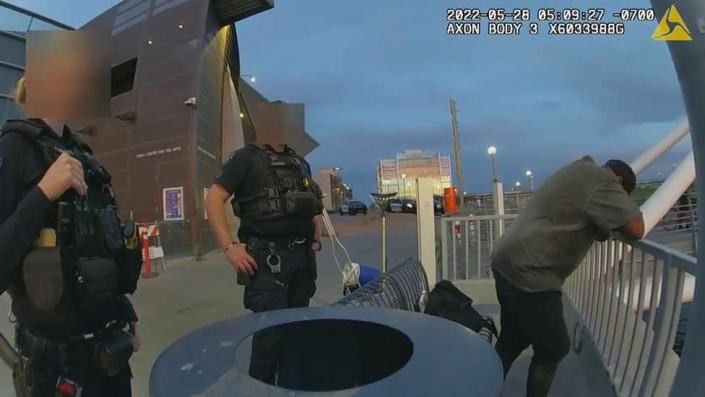 Police body cam footage shows the officers interacting with Sean Bickings before he gets into Tempe Town Lake