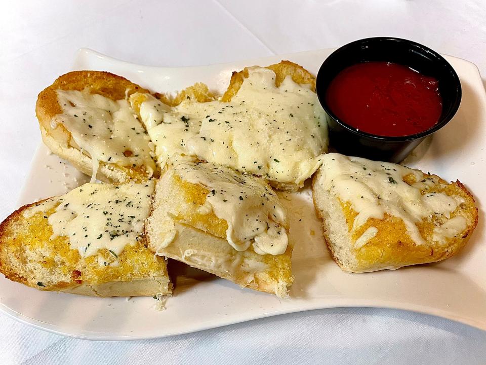 Garlic bread and melted mozzarella from Sergio's Pizza Kitchen and Italian Restaurant.