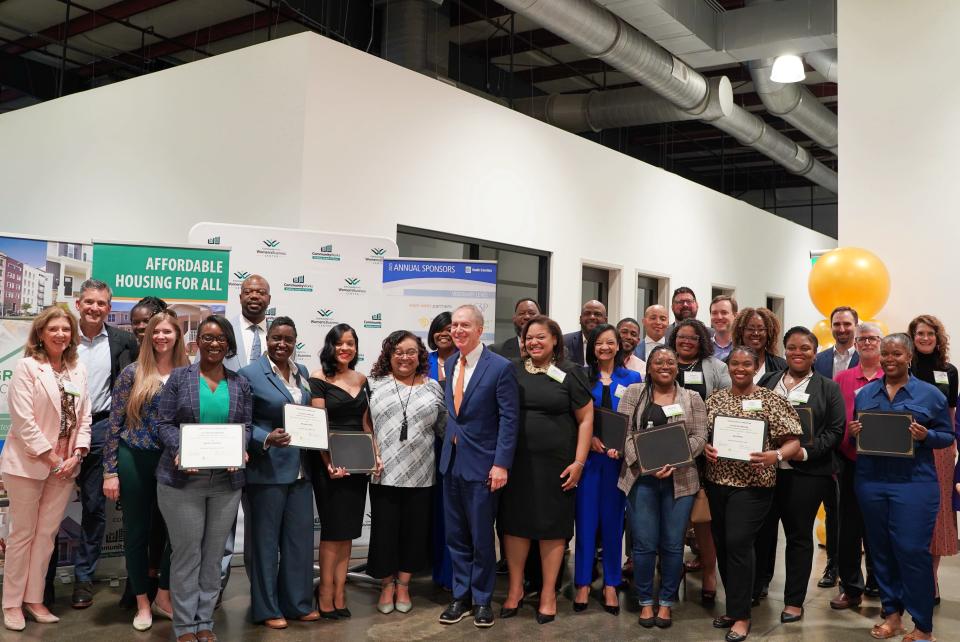 Participants of the Urban Land Institute's Real Estate Diversity Initiative program pictured with Mayor Knox White at the REDI program's graduation March 28