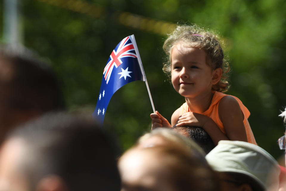 Attendees of the Australia Day parade are seen during Australia Day celebrations in Melbourne.