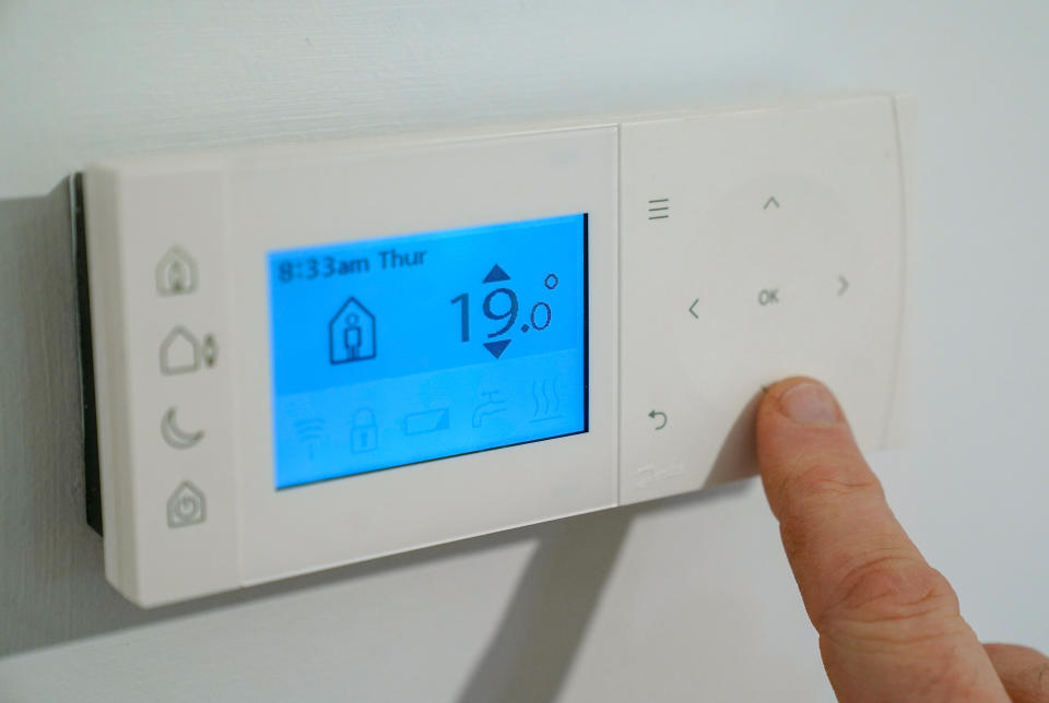 A homeowner turns down the temperature of a central heating thermostat in Basingstoke, Hampshire. Ofgem is expected to announce that the energy price cap is to rise by 50 percent because of soaring wholesale gas prices, meaning the average bill could hit �1,915. Picture date: Thursday February 3, 2022.