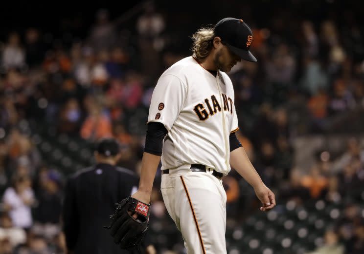 San Francisco Giants relief pitcher Steven Okert walks off the mound after giving up a three-run home run to San Diego Padres' Ryan Schimpf during the ninth inning of a baseball game Tuesday, Sept. 13, 2016, in San Francisco. San Diego won 6-4. (AP Photo/Marcio Jose Sanchez)