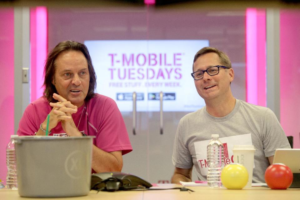 Mobile president and chief executive officer John Legere, left, and chief operating officer Mike Sievert. Ron Wurzer/AP Images for T-Mobile