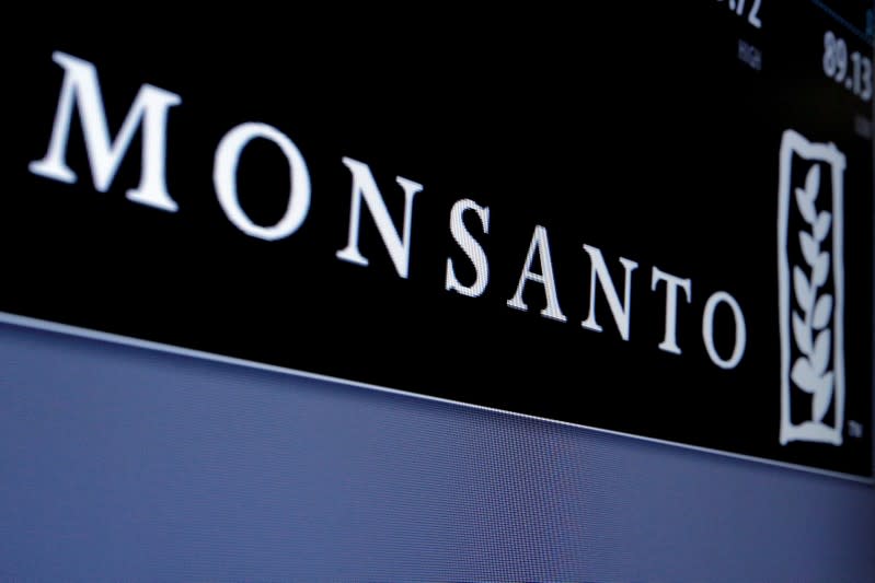FILE PHOTO: Monsanto logo displayed on a screen where the stock is traded on the floor of the NYSE