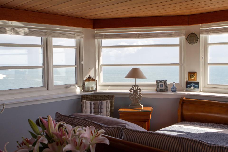 The bedroom looks out to the English Channel