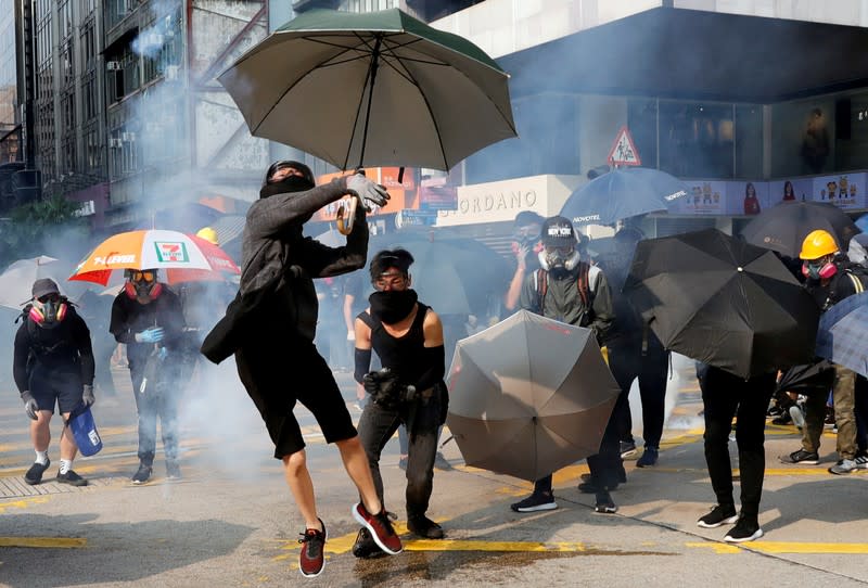 Anti-government demonstrators attend a protest march in Hong Kong