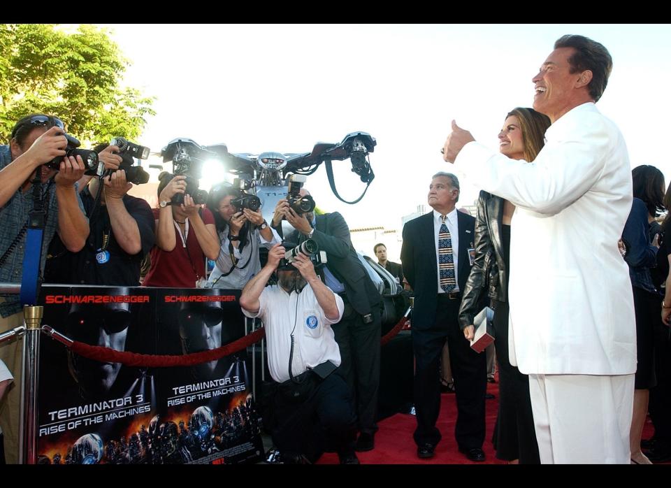 Arnold Schwarzenegger, right, and his wife Maria Shriver, pose for photographers at the world premiere of "Terminator 3: Rise of the Machines" in the Westwood section of Los Angeles, Monday, June 30, 2003. (AP Photo/Chris Pizzello)