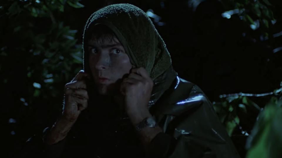 Charlie Sheen hides in the bushes of Vietnam in Platoon