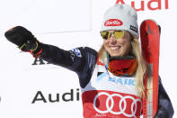 The winner United States' Mikaela Shiffrin celebrates after an alpine ski, women's World Cup slalom, in Are, Sweden, Saturday, March 11, 2023. (AP Photo/Alessandro Trovati)
