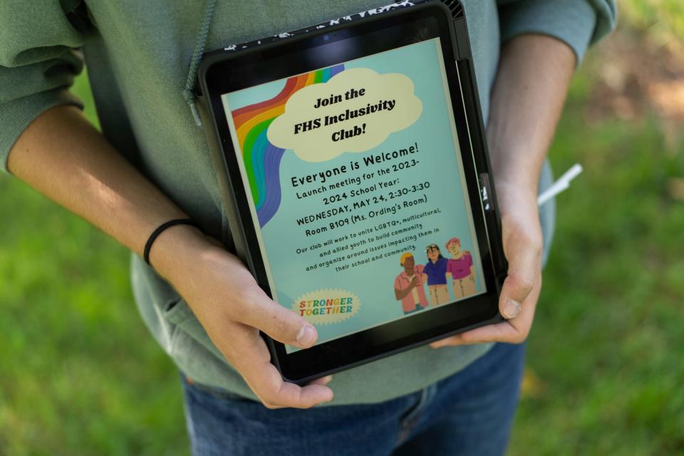 Recent Fowlerville High School graduate Gavin Tschirret, 17, of Fowlerville, who was active in organizing against his school board, shows a design for a poster he put up for his school's gay straight alliance known as The Umbrella Club which were ripped down. Fowlerville's school board is now trying to ban displays of pride. 