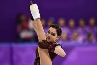 <p>Russia’s Evgenia Medvedeva competes in the women’s single skating free skating of the figure skating event during the Pyeongchang 2018 Winter Olympic Games at the Gangneung Ice Arena in Gangneung on February 23, 2018. / AFP PHOTO / ARIS MESSINIS </p>