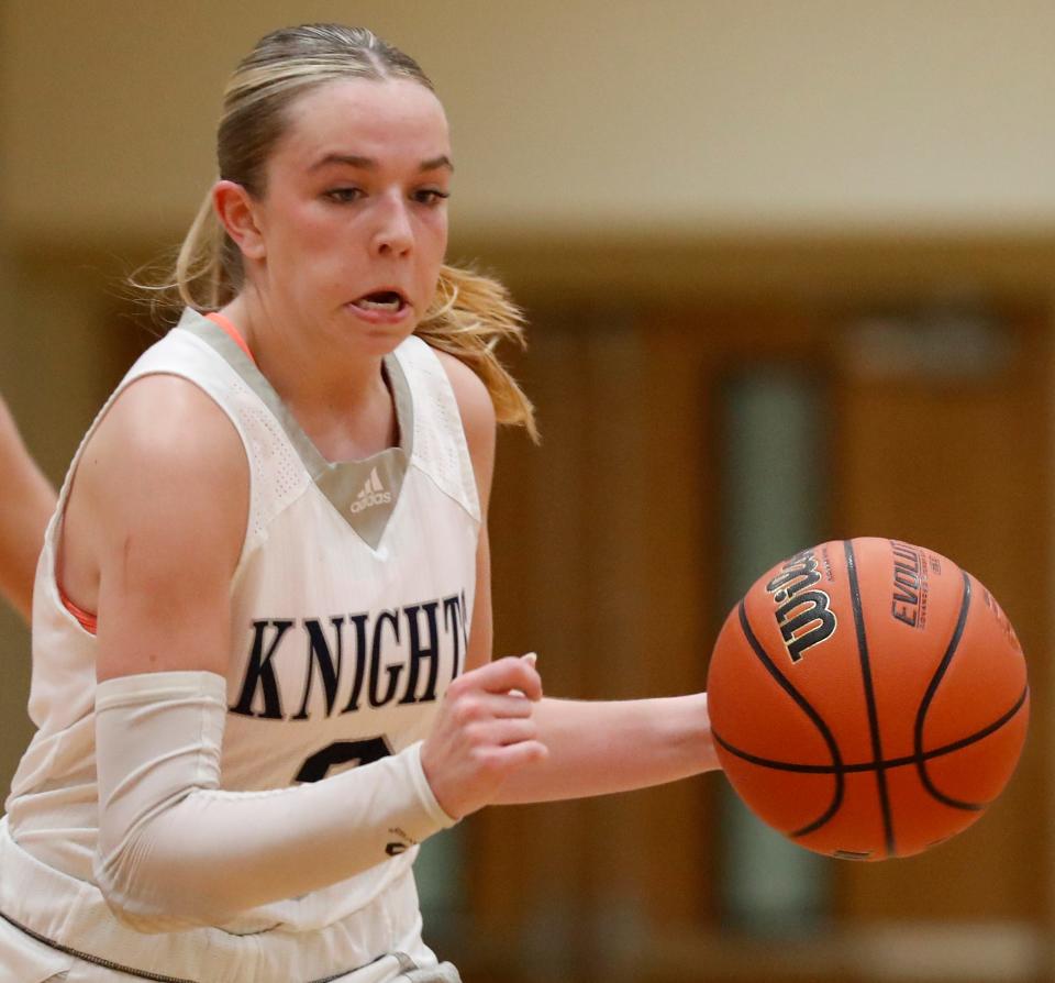 Central Catholic Knights Grace Bordenet (3) drives to the basket during the IU Health Hoops Classic girl’s basketball third place game against the Benton Central Bison, Saturday, Nov. 18, 2023, at Harrison High School in West Lafayette, Ind. Benton Central won 63-42.