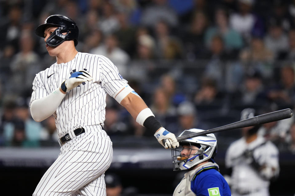 New York Yankees' Aaron Judge watches his single against the Toronto Blue Jays during the fifth inning of a baseball game Thursday, Sept. 21, 2023, in New York. (AP Photo/Frank Franklin II)