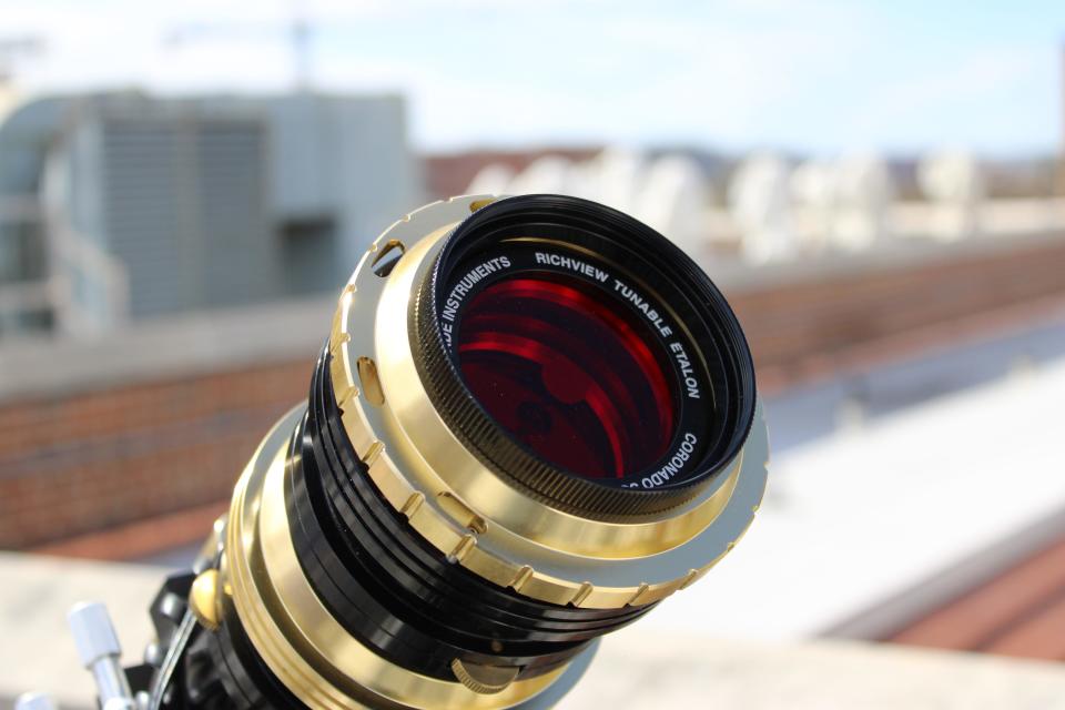 A solar telescope with a hydrogen-alpha filter on top of the Nielsen Physics building at the University of Tennessee at Knoxville. Solar telescopes allow the user to view the sun safely. March 18, 2024.