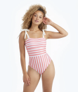 <p><strong>Summersalt </strong></p><p>summersalt.com</p><p><strong>$125.00</strong></p><p><a href="https://www.summersalt.com/products/the-tie-oasis-nautical-stripe-in-nantucket-red" rel="nofollow noopener" target="_blank" data-ylk="slk:Shop Now;elm:context_link;itc:0;sec:content-canvas" class="link ">Shop Now</a></p><p><strong><del>$125</del> $87.59 (30% off with code)</strong></p><p>Adjustable tie shoulder straps and a colorful striped print give this best-selling one-piece a fun nautical-inspired feel. One reviewer says it also holds you in like a pair of <a href="https://www.cosmopolitan.com/style-beauty/fashion/g38254934/best-leggings/" rel="nofollow noopener" target="_blank" data-ylk="slk:luxury leggings;elm:context_link;itc:0;sec:content-canvas" class="link ">luxury leggings</a>, and who doesn't want that?!<br></p>