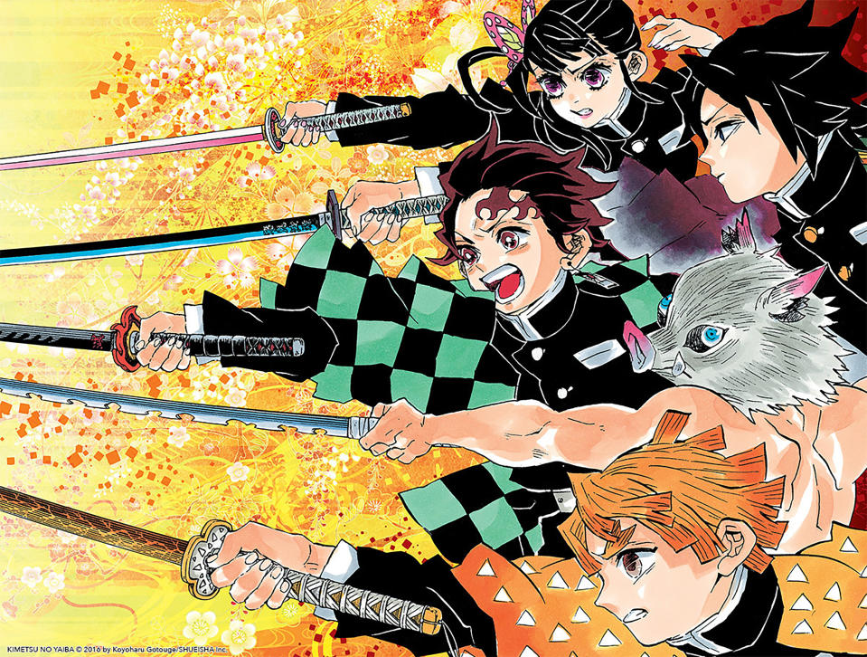 This image released by KIMETSU NO YAIBA©2016 by Koyoharu Gotouge/SHUEISHA Inc. shows a scene of the manga book “Demon Slayer.” “Demon Slayer,” directed by Haruo Sotozaki, has become the biggest grossing film for Japan, including live-action films, and has struck a chord with pandemic-era Japan, and possibly with the world. (KIMETSU NO YAIBA©2016 by Koyoharu Gotouge/SHUEISHA Inc. via AP)