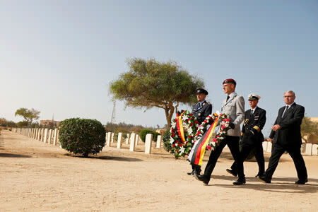 German officials and veterans attend a ceremony for the anniversary of the Battle of El Alamein, at El Alamein war cemetery in Egypt, October 20, 2018. REUTERS/Amr Abdallah Dalsh