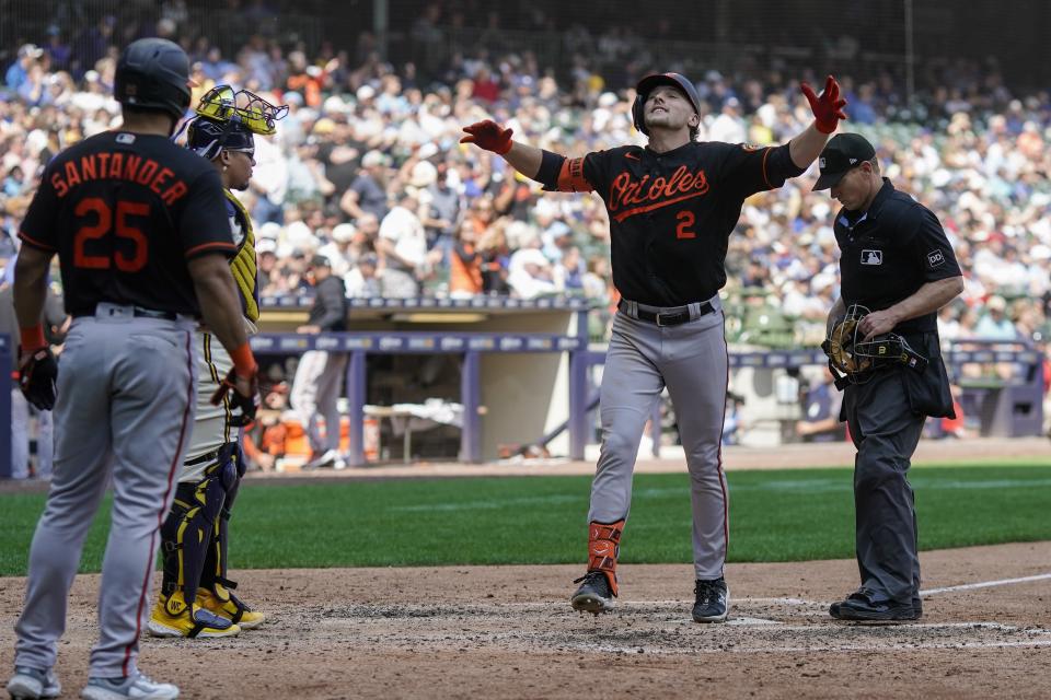 Baltimore Orioles' Gunnar Henderson celebrates after hitting a two-run home run during the eighth inning of a baseball game against the Milwaukee Brewers Thursday, June 8, 2023, in Milwaukee. (AP Photo/Morry Gash)