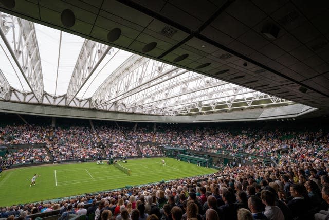 Spectators watch the action on Centre Court 