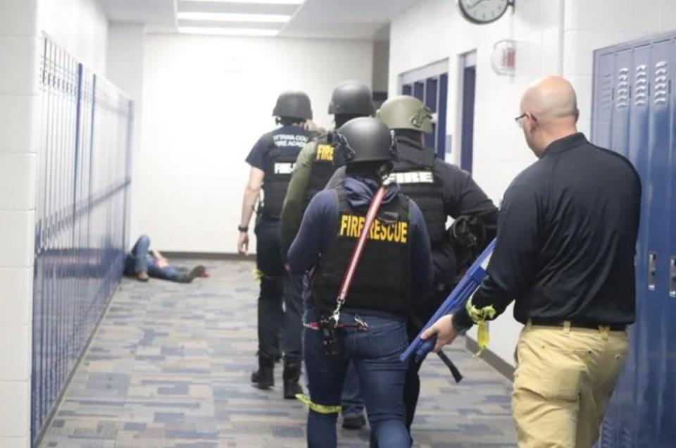 Less than 12 hours after the latest deadly mass school shooting in the United States, local first responders re-enacted active shooter scenarios at Grand Haven High School.