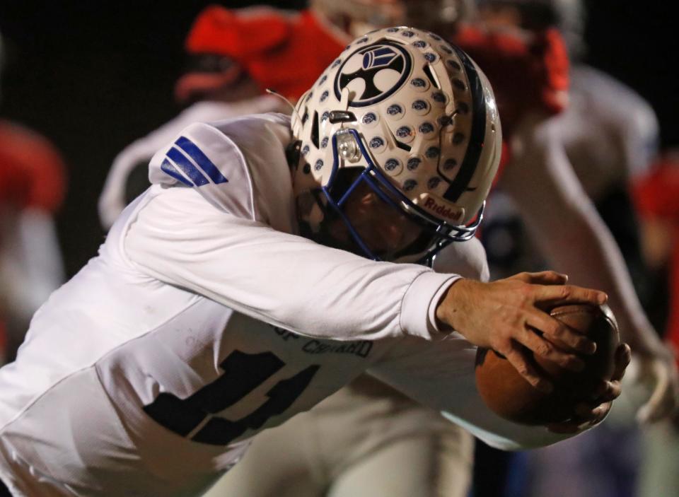 Bishop Chatard Trojans Drew Vanvleet (11) dives into the end zone during the IHSAA semi state football game against the West Lafayette Red Devils, Friday, Nov. 18, 2022, at Gordan Straley Field in West Lafayette, Ind. Bishop Chatard leads 14-3.