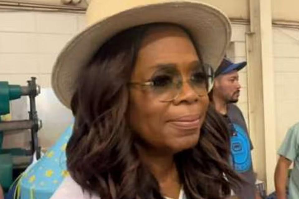 Oprah Winfrey has been handing out humanitarian aid at emergency shelters (BBC)