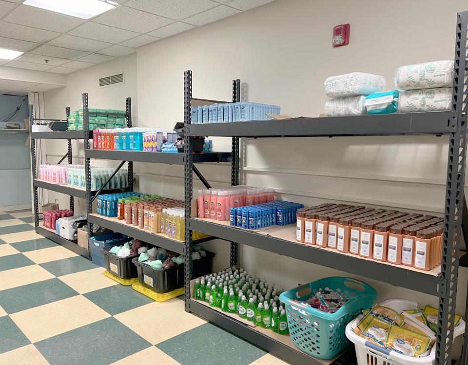 Hygiene products are stocked on shelves assembled by JLG Industries volunteers, and ready for distribution by United Way of Washington County.