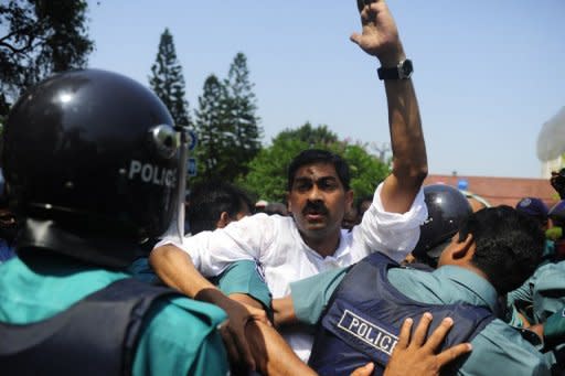 Members of parliament from the Bangladesh Nationalist Party clash with riot police during a nationwide strike in Dhaka on Sunday. Rights groups have blamed security agencies for the disappearance of dozens of opposition activists over the past two years, alleging the victims have been abducted on government orders