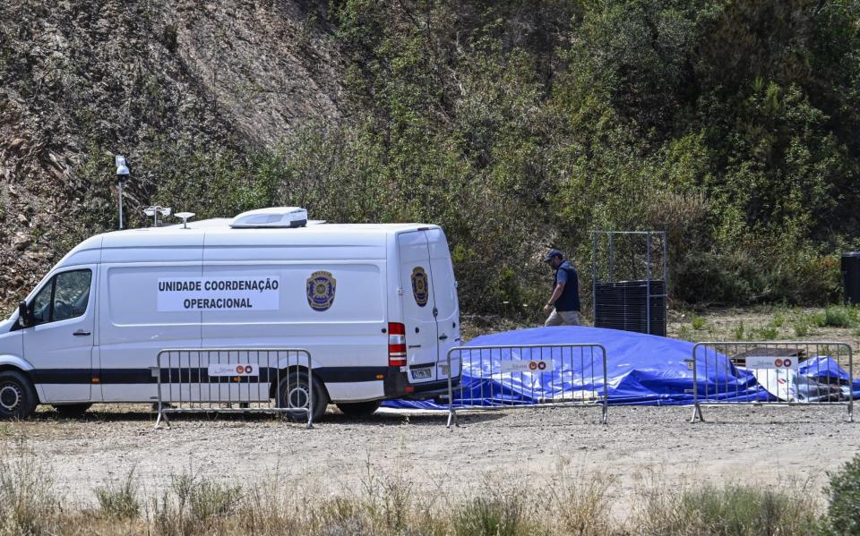 Portuguese police investigators at Barragem do Arade Reservoir - Getty 