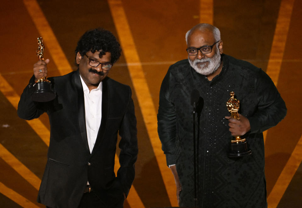 M.M. Keeravaani and Chandrabose accept the Best Original Song award for 